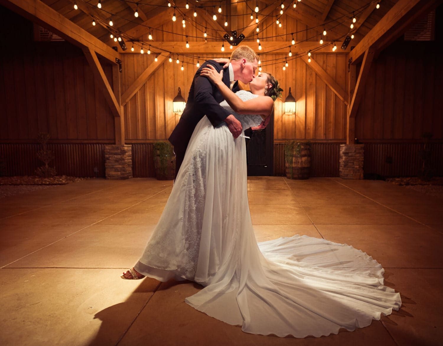 Kansas city wedding couple dip kiss